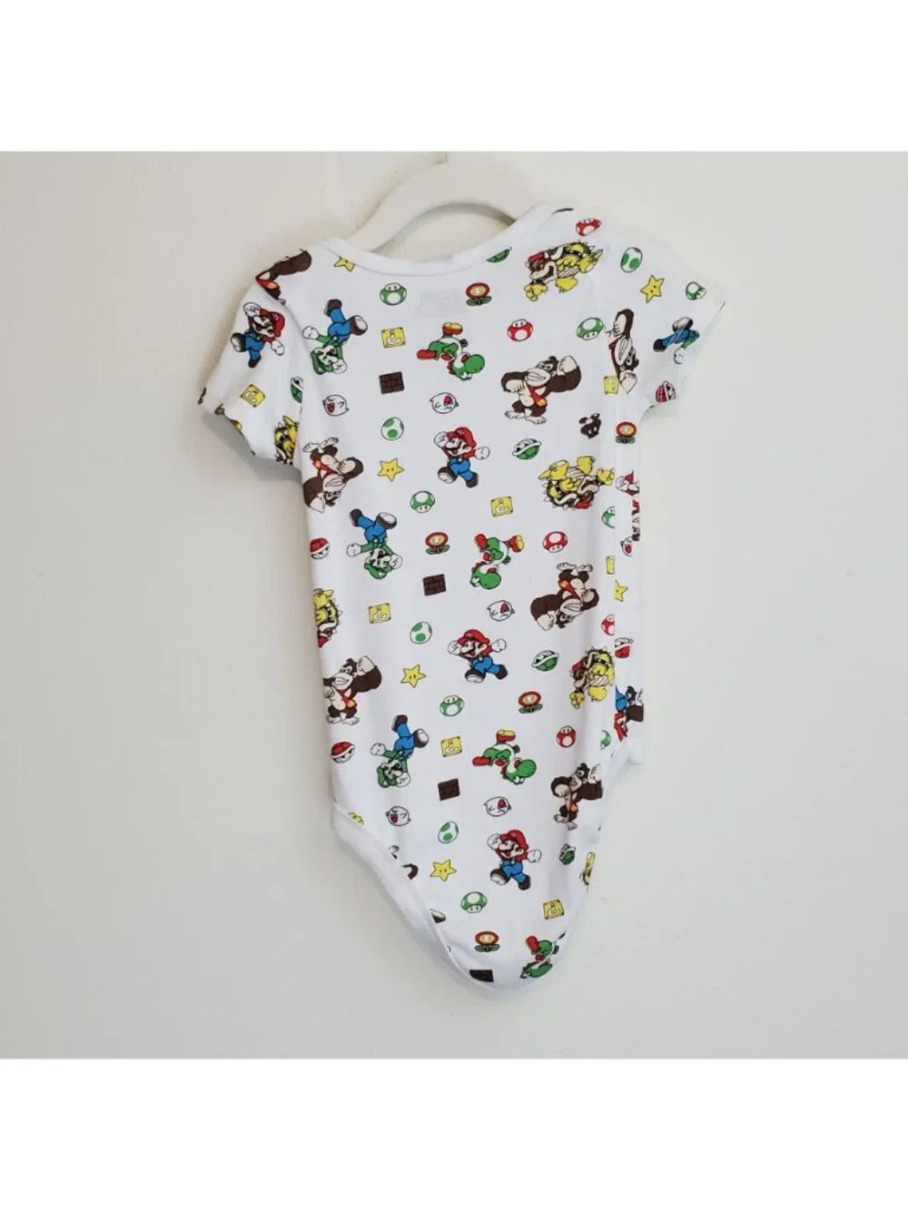 Super Mario Nintendo all-over-print baby onesie